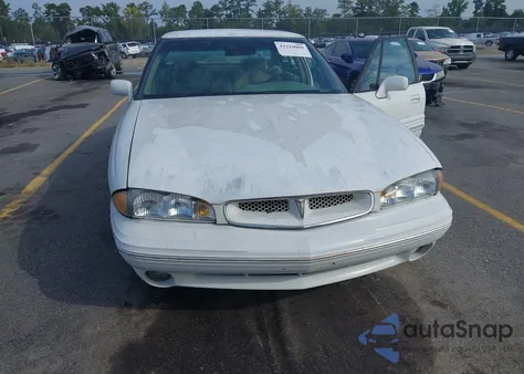 1999 Pontiac Bonneville Se из США, поврежденный, VIN 1G2HX52K7XH254153